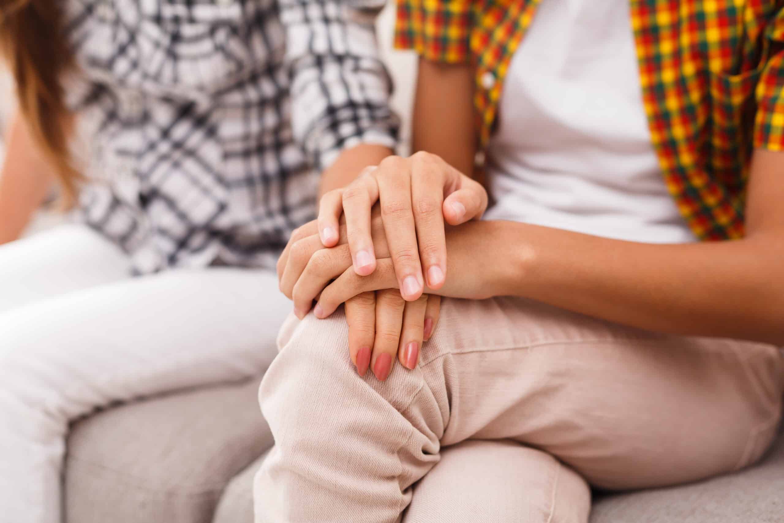 Closeup of female hands. Diversity, support, unity, helping hand and friendship concept.